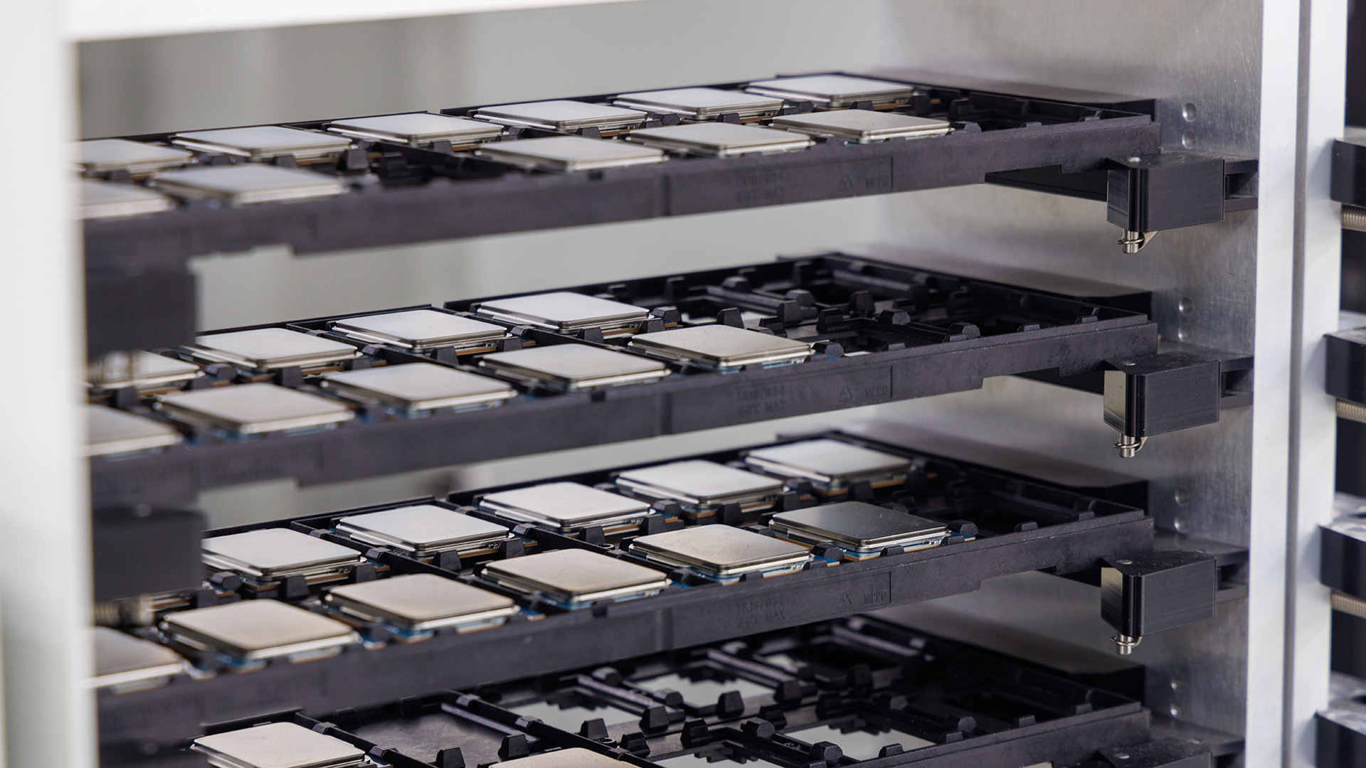 Trays of 12th or 13th Gen Intel processors waiting to be tested.