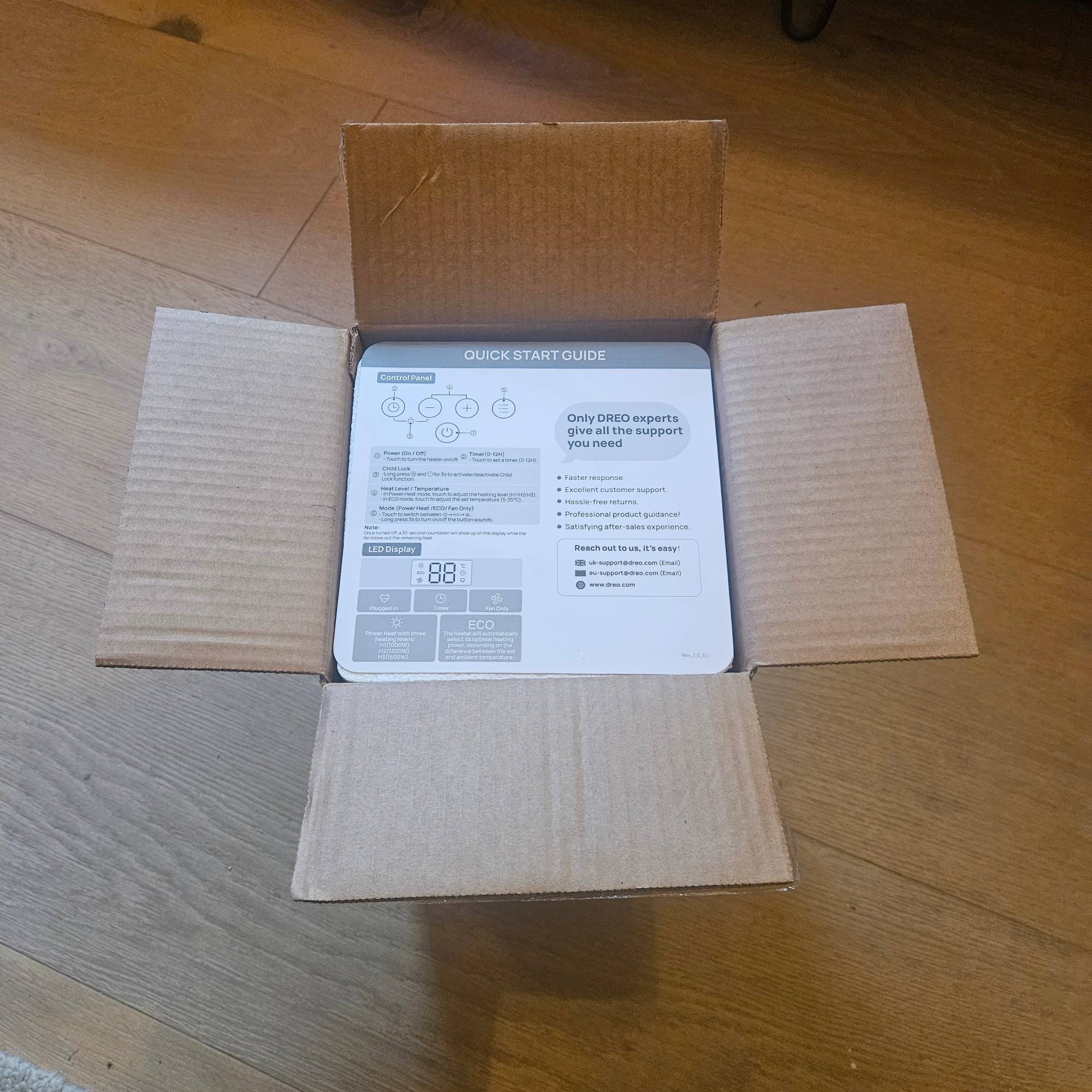 dreo heater in cardboard box with quickstart guide