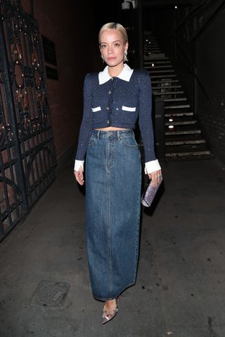 Lily Allen's long denim skirt and sparkly pink clutch