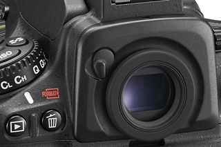 Many of Nikon's enthusiast and professional DSLRs have a small blind built into the viewfinder