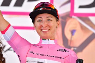 Leah Kirchmann wears the pink leader's jersey at the 2018 Giro d'Italia Donne