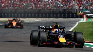 Max Verstappen leads Oscar Piastri in the Imola GP