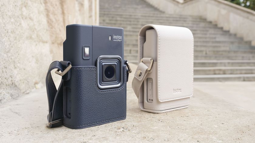 Two Fujifilm Instax mini LiPlay+ hybrid instant cameras side by side in two colorways, besides old steps
