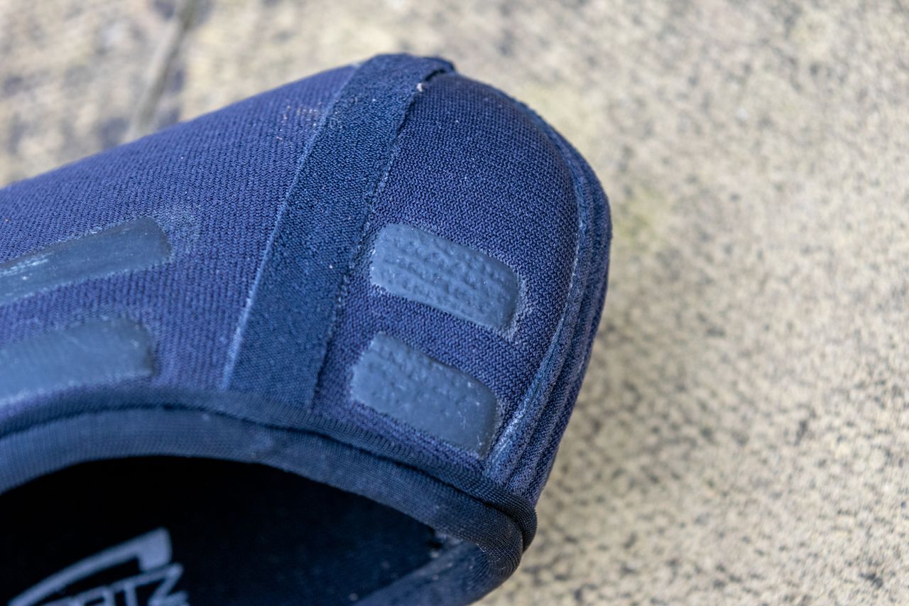 An inside out Pro Stealth overshoe showing the internal insulation