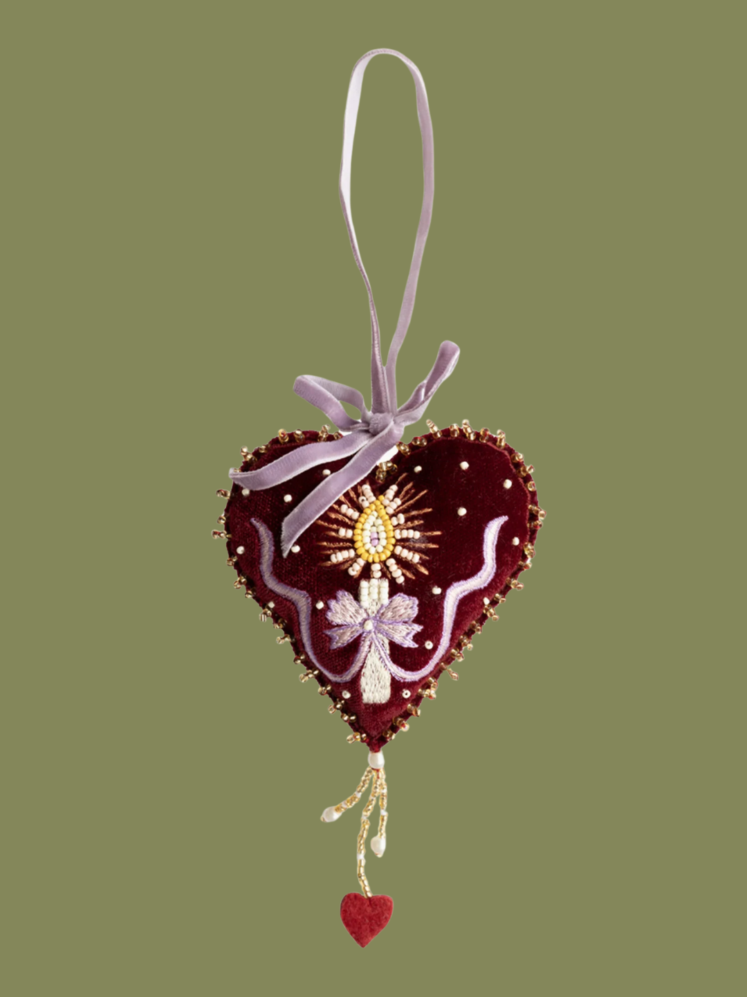A velvet embroidered heart candle ornament from All the Luck in the World