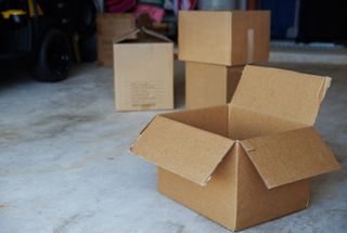 Cardboard boxes on a garage floor