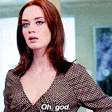 Emily Blunt turns her head in shock as she mouths the words, "Oh God."
