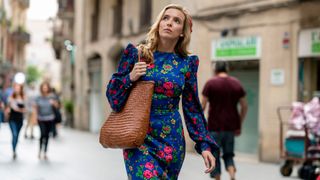 Jodie Comer in 'Killing Eve' season 3 in a blue floral dress