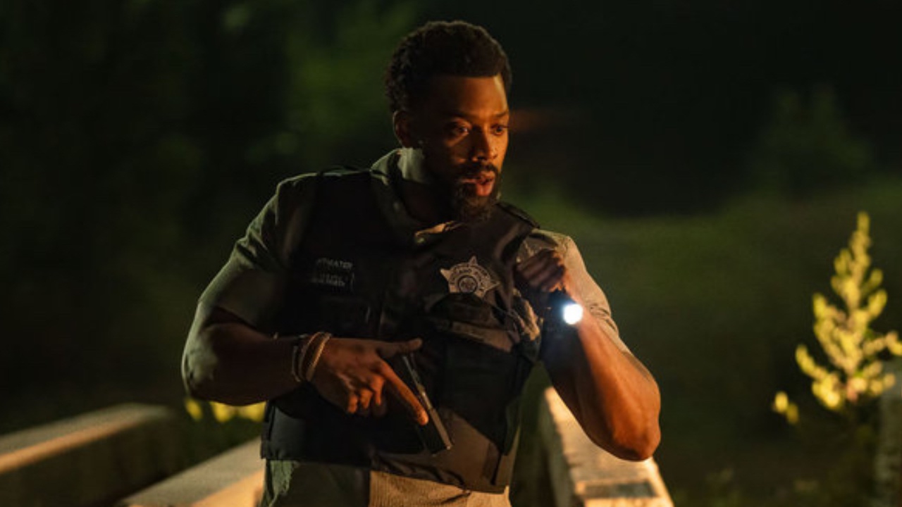 Atwater using his flashlight on the scene of a crime in Chicago P.D. Season 13x01