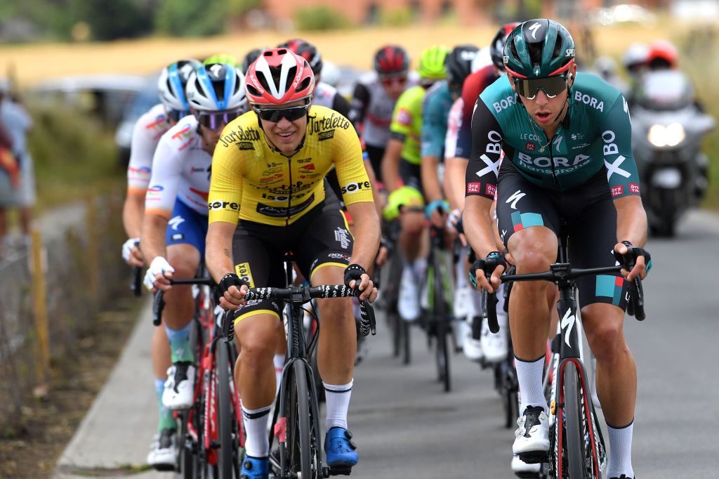 CHAPELLELEZHERLAIMONT BELGIUM JULY 27 LR Luc Wirtgen of Luxembourg and Team Bingoal Pauwels Sauces Wb and Patrick Gamper of Austria and Team Bora Hansgrohe compete in the breakaway during the 43rd Ethias Tour de Wallonie 2022 Stage 5 a 2148km stage from Le RoeulxChapellelezHerlaimont ethiastourdewallonie22 on July 27 2022 in ChapellelezHerlaimont Belgium Photo by Luc ClaessenGetty Images