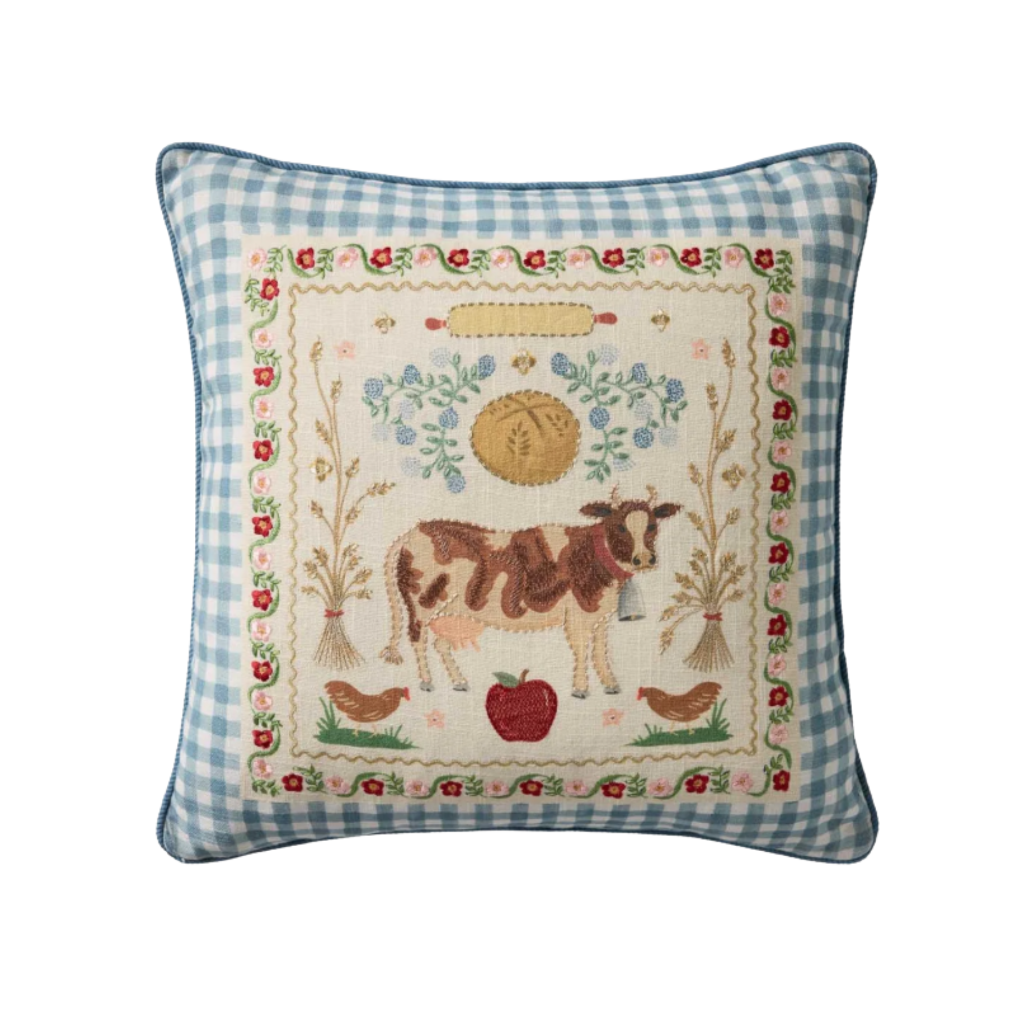 a pillow with a cow on it