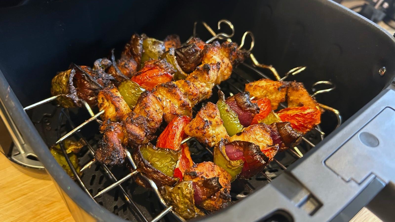 Food on skewers inside Bosch Series 6 Air Fryer