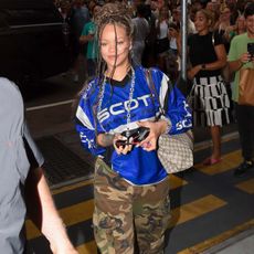 rihanna wearing a jersey and cargo pants