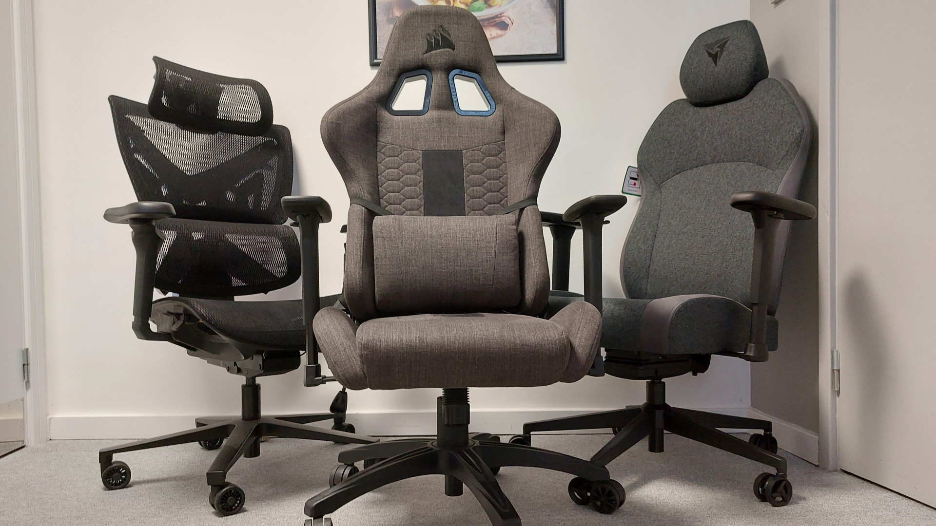 Gaming chairs photographed in an office environment.