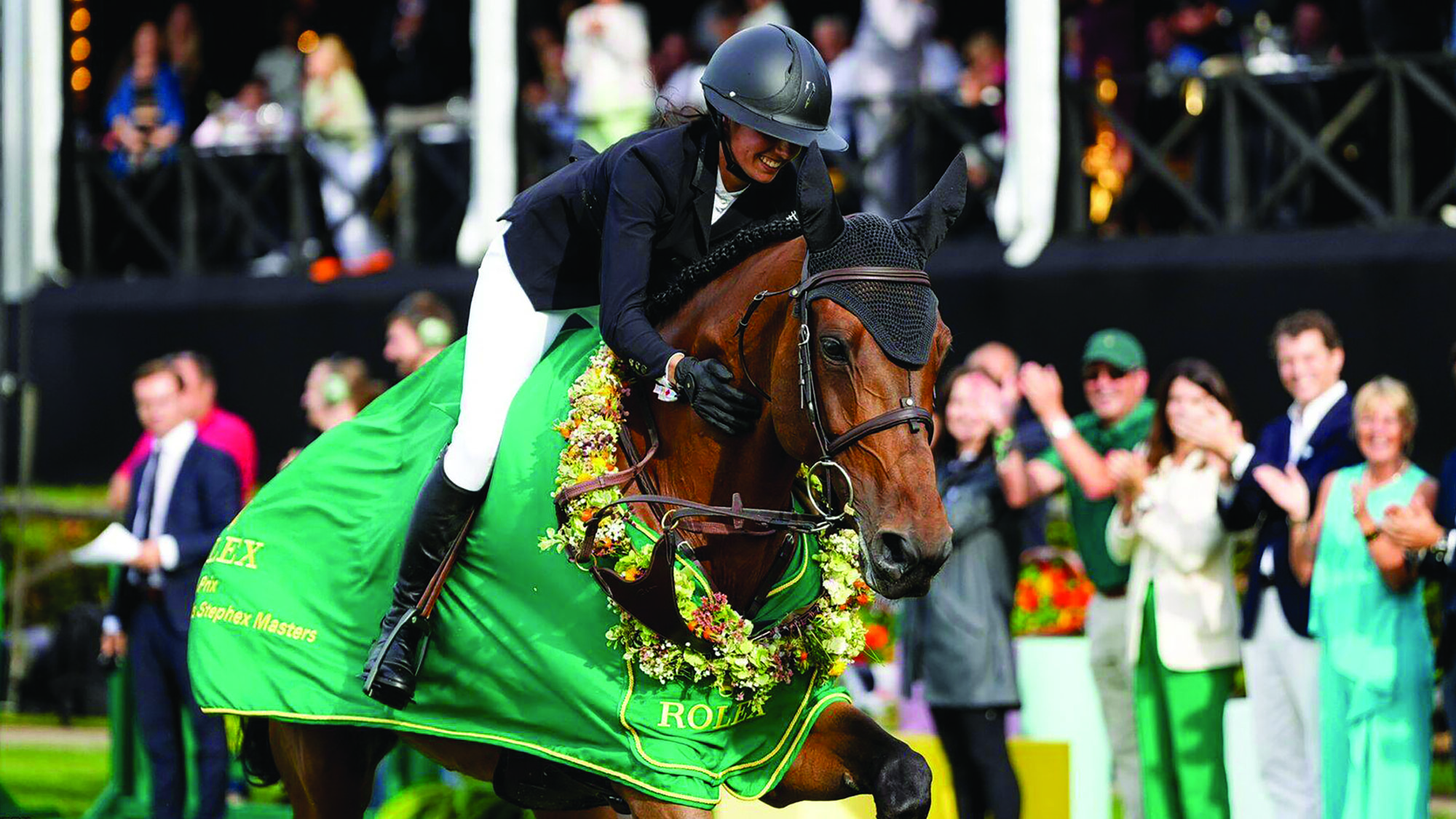 Nina Mallevaey riding lap of honour at Royal Windsor