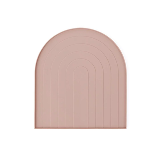 arched rose-colored drying mat