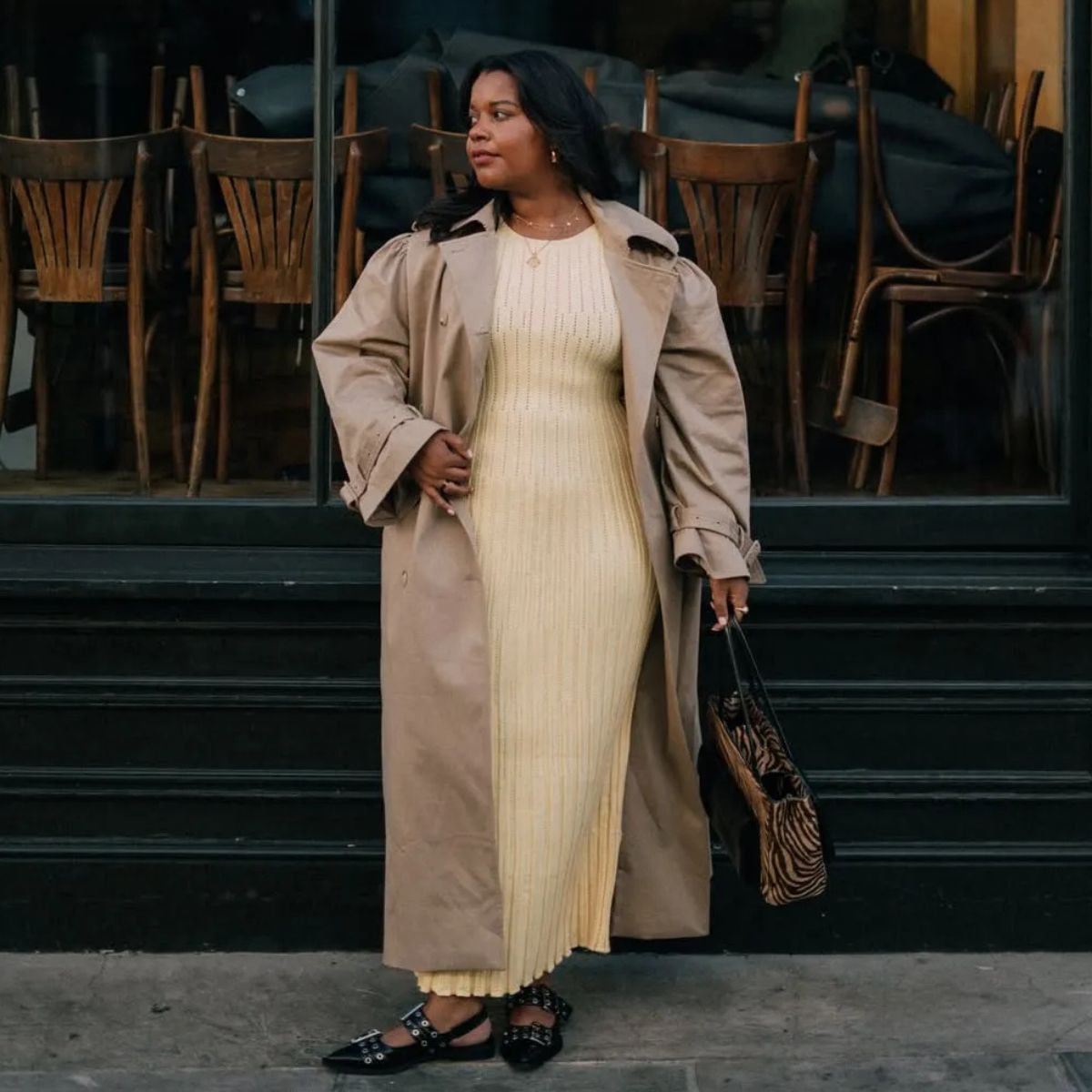 woman wears yellow maxi dress in a smart workwear outfit