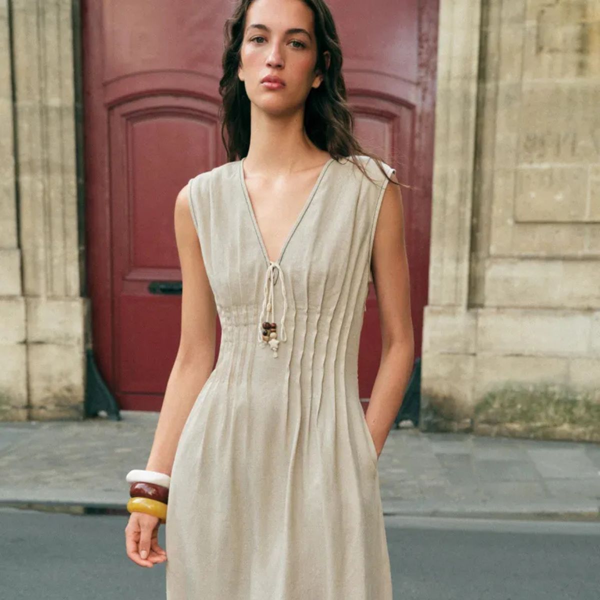 Woman wears linen dress