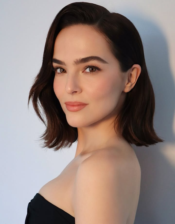Zoey Deutch with deep espresso hair and makeup done by Hung Vanngo.