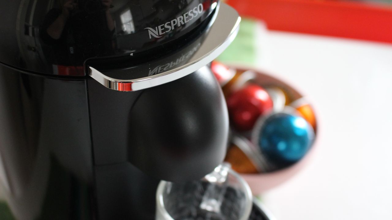 Nespresso Vertuo Plus coffee maker on kitchen counter