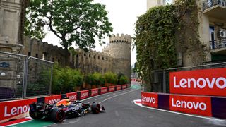 Max Verstappen driving his Red Bull through the Baku City Circuit at the Azerbaijan Grand Prix in 2025