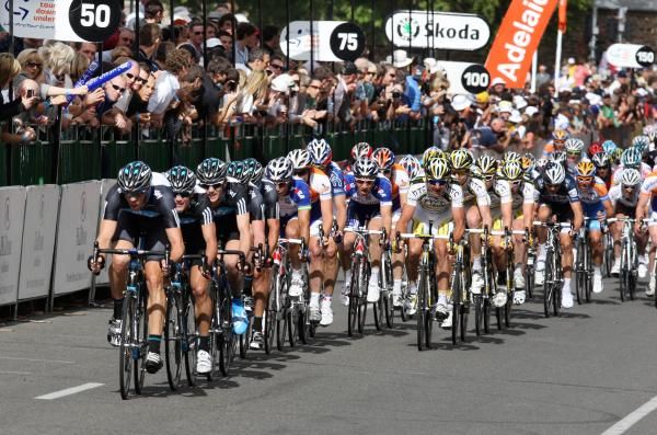 The Sky team train gets on the front with two laps to go.