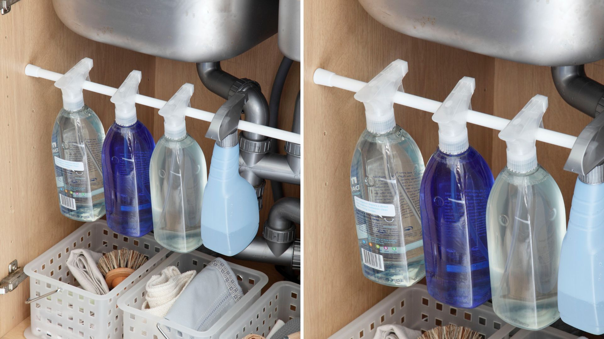 Under sink cupboard with cleaning bottles hanging from an extendable tension rod to show how to organise under a kitchen sink
