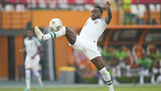 Samuel Osayi Bright stretches to control the ball for Nigeria at AFCON