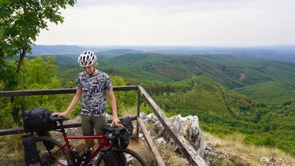 Image shows Anna on a bikepacking trip in Central Europe.