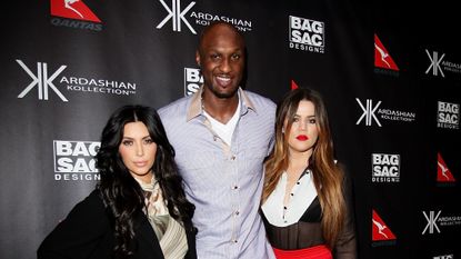 Lamar Odom with two of the Kardashian sisters