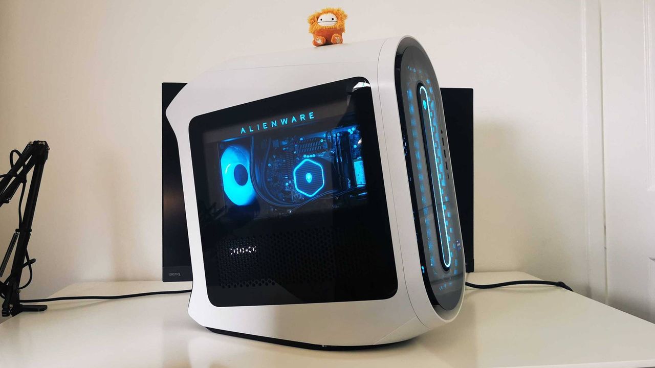Alienware Aurora R15 on desk with bigfoot squishmallow sitting on top