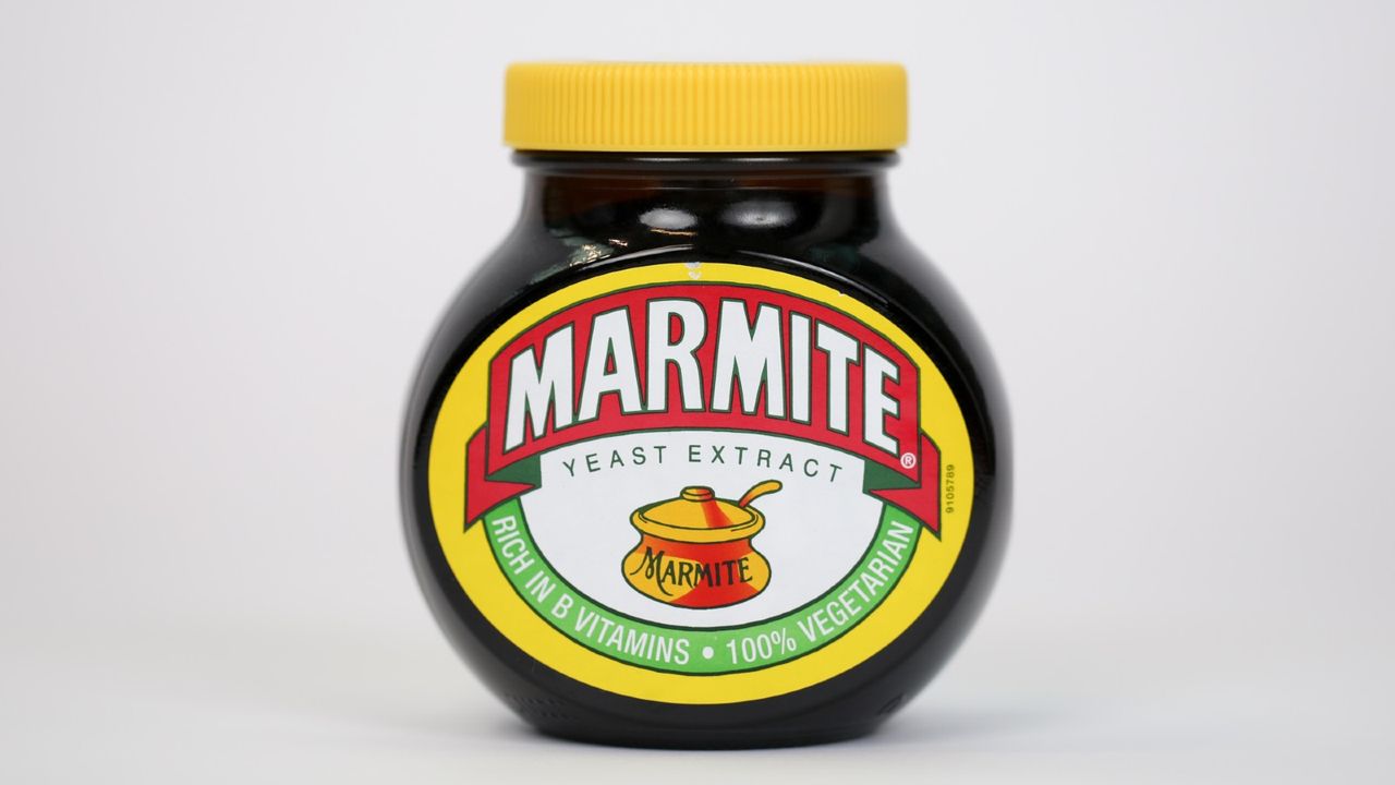 A jar of Marmite, manufactured by Unilever NV, stands in this arranged photograph in London