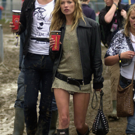 ate Moss and Pete Doherty walk backstage on the second day of the Glastonbury Music Festival 2005 at Worthy Farm, Pilton on June 25, 2005 in Somerset, England.