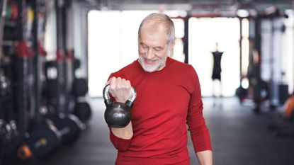 Man doing cross training workout in gym