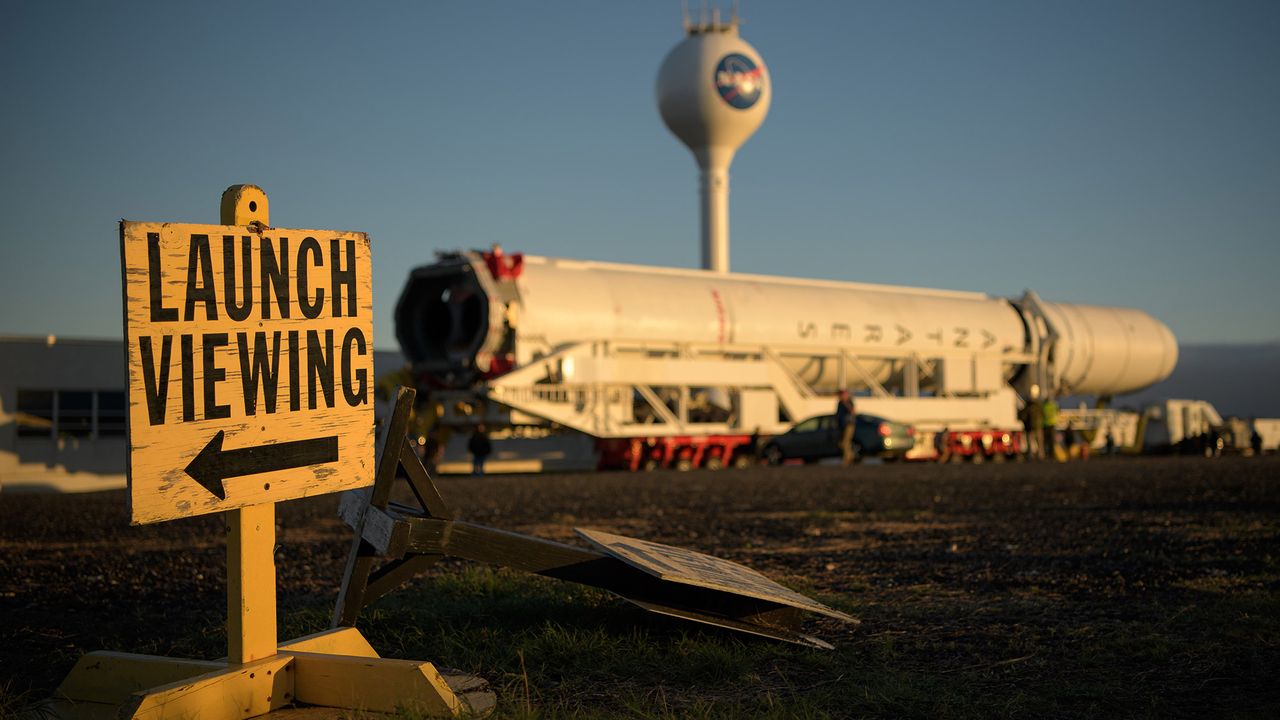 A Northrop Grumman Antares rocket is seen as it rolls out to Pad-0A, Tuesday, Oct. 29, 2019, at NASA's Wallops Flight Facility in Virginia.