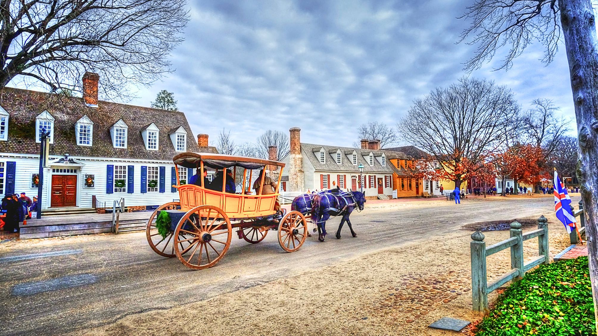 A carriage being driven through Colonial Williamsburg