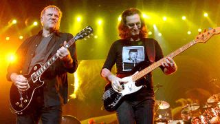 Rush’s Alex Lifeson and Geddy Lee onstage in 2012