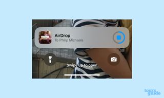 iOS 17.1 AirDrop transfer in progress
