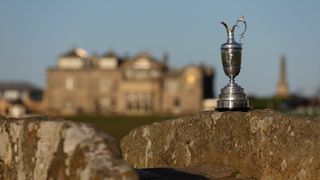 The Claret Jug sits on the The Swilcan Bridge at St Andrews Old Course