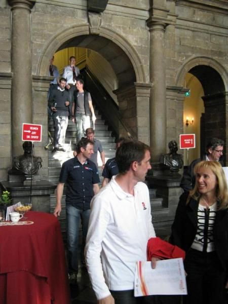 Team managers leaving the pre-race meeting in Maastricht