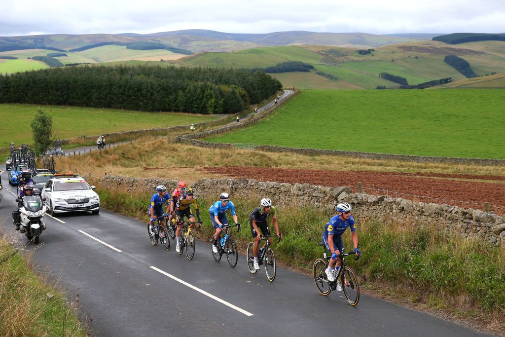EDINBURGH SCOTLAND SEPTEMBER 11 LR Davide Ballerini of Italy and Team Deceuninck QuickStep Matthew Gibson of United Kingdom and Team Ribble Weldtite Pro Cycling Pascal Eenkhoorn of Netherlands and Team Jumbo Visma Christopher Blevins of United States and Team Trinity Racing and Yves Lampaert of Belgium and Team Deceuninck QuickStep compete in the breakaway during the 17th Tour of Britain 2021 Stage 7 a 1948km stage from Hawick to Edinburgh TourofBritain TourofBritain on September 11 2021 in Edinburgh Scotland Photo by Alex LiveseyGetty Images