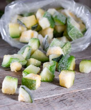 A bag of cubed zucchini that has been frozen after harvest