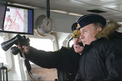 Vladimir Putin and Russian admiral Nikolai Yevmenov