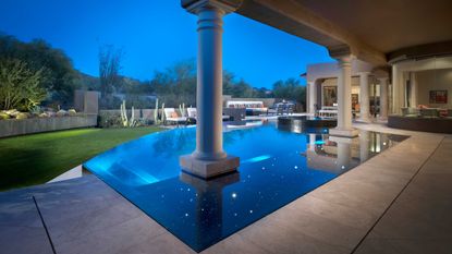 pool lighting ideas in pool surrounding area at night time