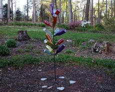 Multicolored Glass Bottled Tree In Garden