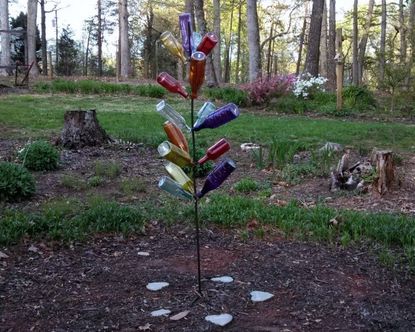 Multicolored Glass Bottled Tree In Garden