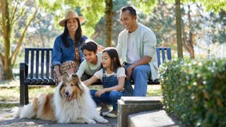 Family in park with dog