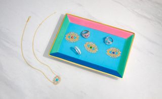 Blue jewellery tray with jewellery in it