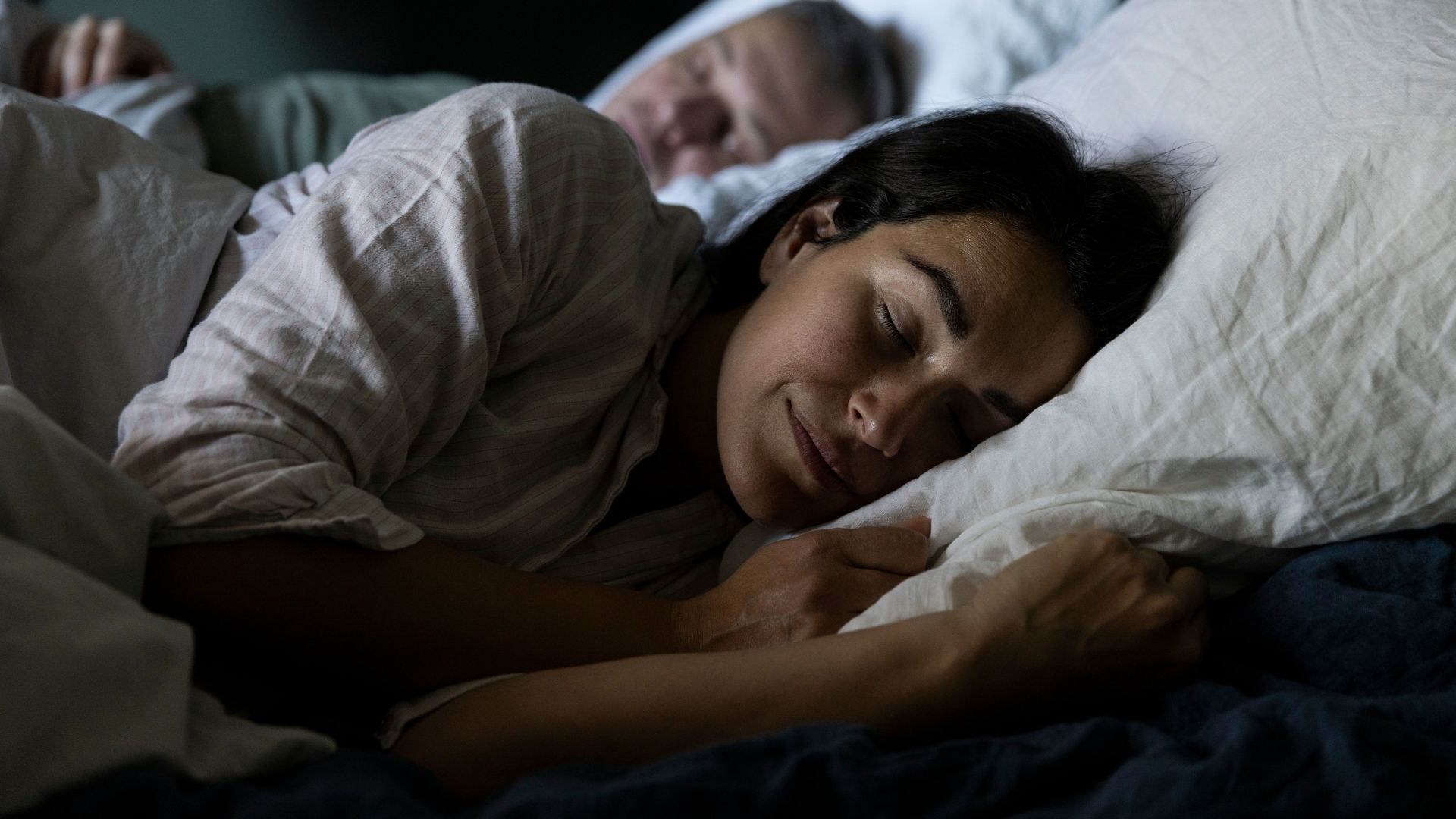 Woman in bed sleeping