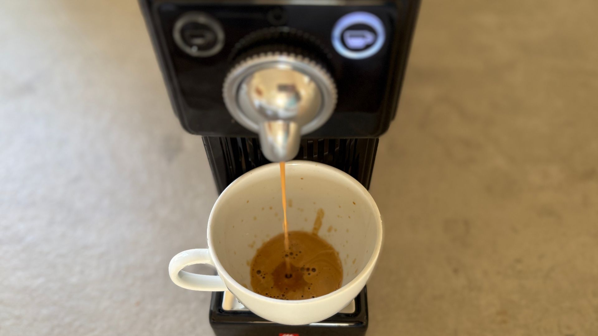 coffee being made in the illy X3 coffee machine
